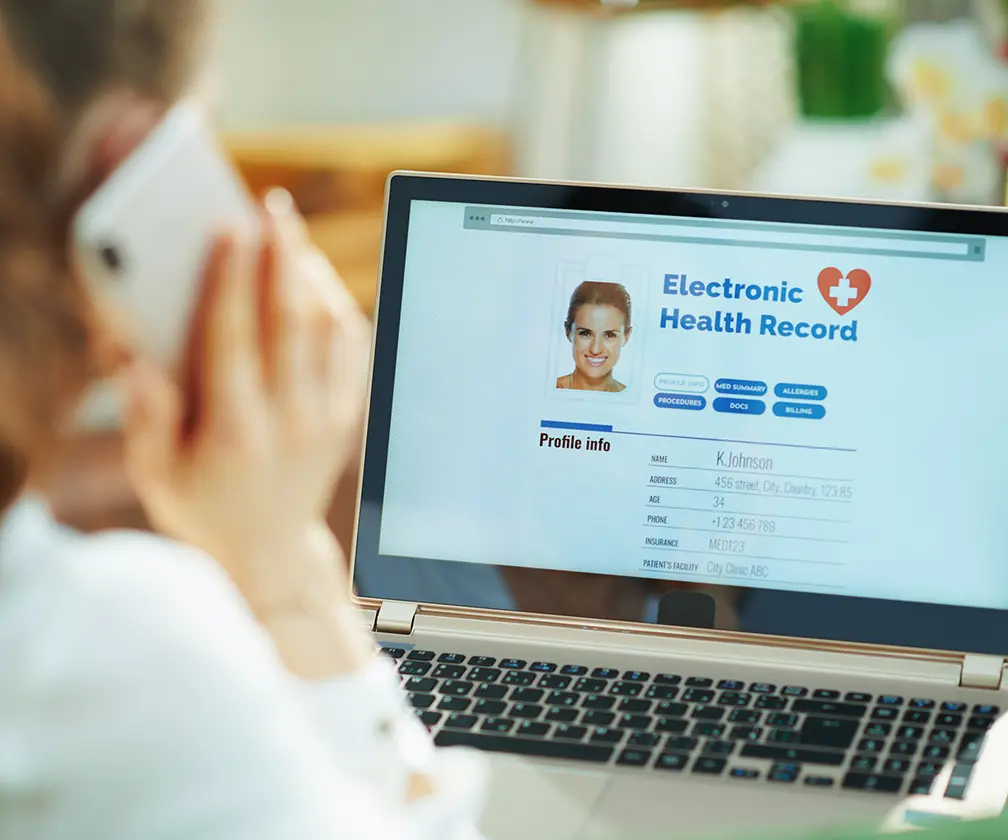photo of patient viewing their EHR home screen on a laptop